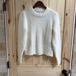 J.Crew Puff-Sleeve Fuzzy Crewneck Sweater in an ivory or cream color.